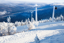 Funicular In The Snowy Mountains. Gondola. Holidays In The Mountains. Snow-covered Christmas Trees. Sports Recreation