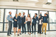 © Suriyo - Business people teamwork group are happy finished success business project standing in office congratulation