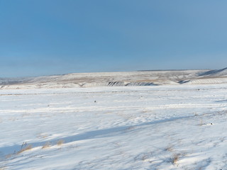 Wall Mural - view of the steppe on a clear Sunny winter day