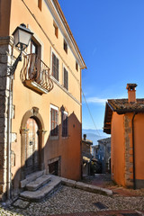 Veroli, Italy, 01/03/2020. A narrow street between the old houses of a medieval village