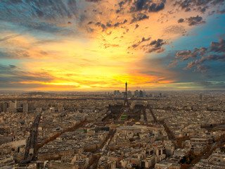 paris skyline with eiffel tower at sunset in paris