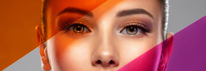 beautiful white girl with bright eye-makeup. beautiful fashion woman with a colored items. glamour f