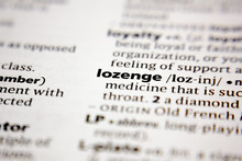Word Or Phrase Lozenge In A Dictionary.