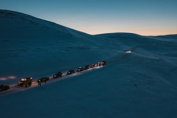 Sticker - High angle shot of a snowy frozen convoy towards the Nordkapp, Norway