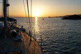 Fototapeta Zachód słońca - sailing yachts at sunset