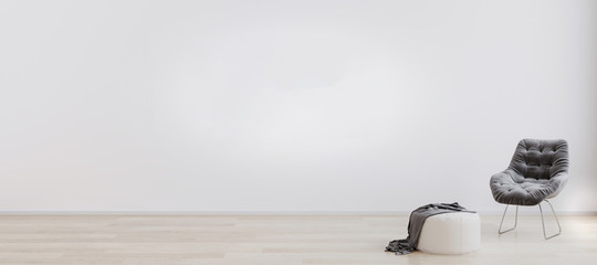 Wall Mural - room with white wall and wooden floor with white pouf and grey modern armchair. bright room interior