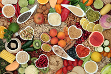 Healthy Vegan Super Food Diet With Fruit, Vegetables, Nuts, Spice, Pasta, Dips, Spice & Grains. High In Protein, Vitamins, Minerals, Antioxidants, Dietary Fibre & Smart Carbs. Ethical Eating Concept. 