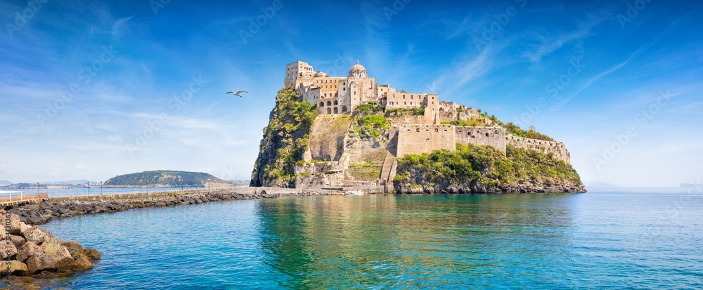 Aragonese Castle is most popular landmark in Tyrrhenian sea near Ischia island, Italy. - obrazy, fototapety, plakaty 