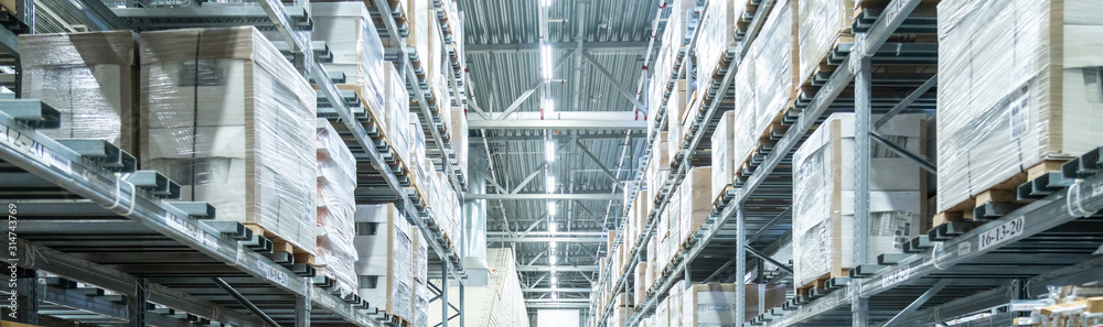 Rows of shelves with boxes in modern warehouse - obrazy, fototapety, plakaty 