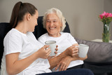 Senior woman talking with granddaughter.