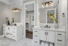 Beautiful Bathroom In New Luxury Home With Two Vanities, Sinks, And Mirrors.