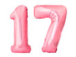 Number 17 seventeen made of rose gold inflatable balloons isolated on white background. Pink helium balloons forming seventeen number