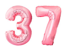 Number 37 Thirty Seven Made Of Rose Gold Inflatable Balloons Isolated On White Background. Pink Helium Balloons Forming 37 Thirty Seven. Birthday Concept