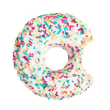White Bitten Donut Decorated With Colorful Sprinkles Isolated On White Background. Take A Bite Concept