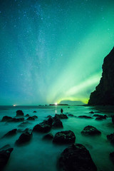 Wall Mural - Aurora Borealis (Northern Lights) above Reynisfjara Beach