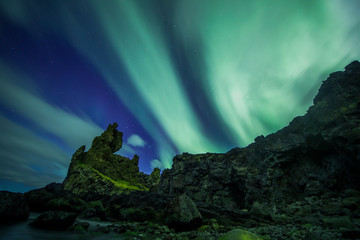 Wall Mural - Aurora Borealis (Northern Lights) above londrangar rock formation