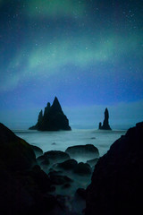 Wall Mural - Aurora Borealis (Northern Lights) above Vik rock formation, Iceland