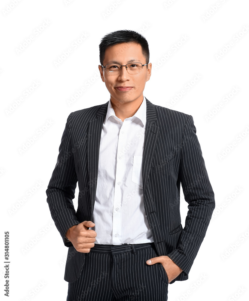 Handsome Asian businessman on white background