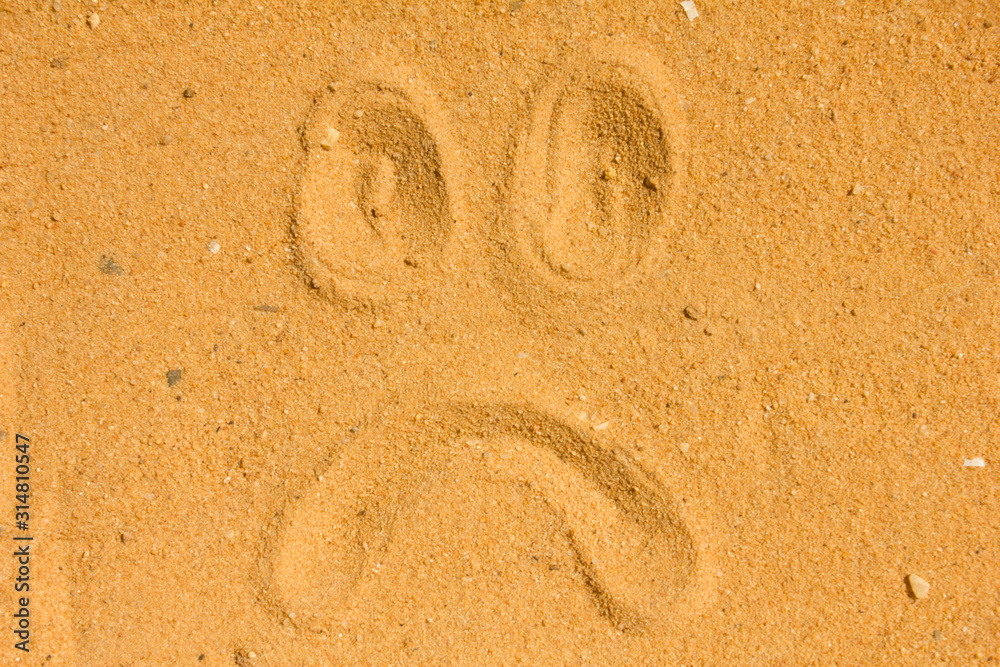 Sad Sand sad face images emotion Draw on the sand and nature Stock Photo | Adobe ...