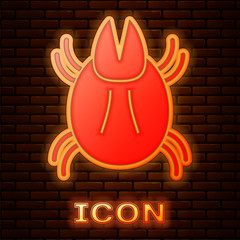 Sticker - Glowing neon Parasite mite icon isolated on brick wall background. Vector Illustration