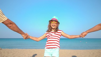 Poster - Happy family having fun on summer vacation. Slow motion