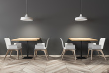 Square Dining Tables In Gray Cafe Interior