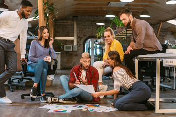 Poster - Casual interior designers working on new project in office