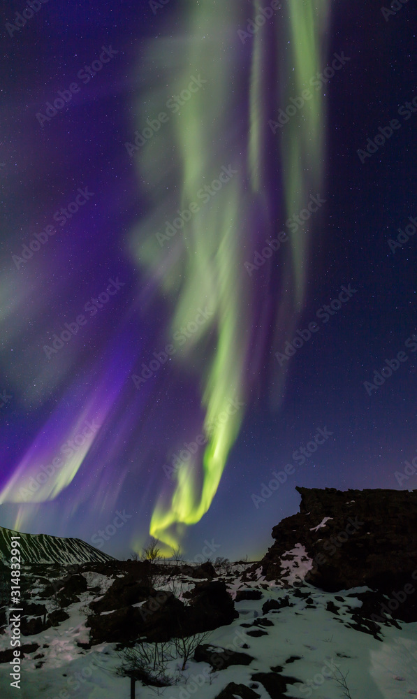 Northern lights above an arctic landscape Stock Photo | Adobe Stock