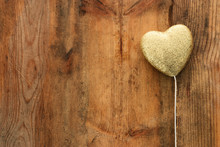 Valentines Day Concept. Gold Glitter Hearts Over Wooden Background. Flat Lay Composition