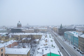 ST. PETERSBURG, RUSSIA - JANUARY, 2019: snowy weather in St. Petersburg, Christmas city, snowfall, view from the Duma Tower on Nevsky Prospect, Zinger House.