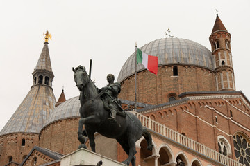 Wall Mural - Pontifical Minor Basilica of Sant'Antonio di Padova from 1232, with the equestrian statue of Gattamelata by Donatello.