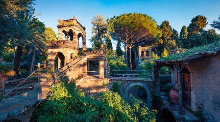 Picturesque evening view of Taormina Giardini della Villa Comunale city park, Sicily, Itale, Europe. Traveling concept background.