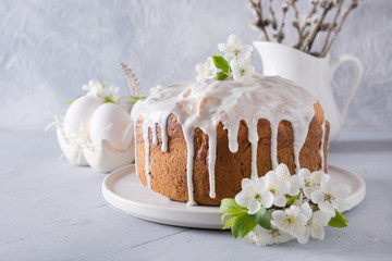 Easter cake decorated spring fresh flowers.