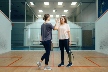 Wall Mural - Two female squash players before competition