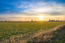 Calm, Serene Landscape, With Young, Green Fields Stretching Toward The Sunset Beneath A Flawless And Beautiful Blue Sky, Lancaster County, Pennsylvania