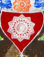 Canvas Print - View of Rangoli drawn on floor during Indian Hindu festival Pongal or makar Sankranti, usually in front of home or temple            