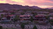 Las Vegas, Jul 2019. Aerial View Of Luxury Las Vegas Houses At Sunset. In One Of The Houses In The Center Of The Frame There Is A Party By The Pool. Elegant People Spend Good Time Resting Together