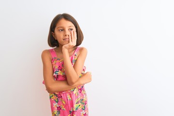 Sticker - Young beautiful child girl wearing pink floral dress standing over isolated white background thinking looking tired and bored with depression problems with crossed arms.