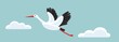 White stork flying among clouds in the sky. Horizontal banner with a bird as symbol for pregnancy, delivery, news.