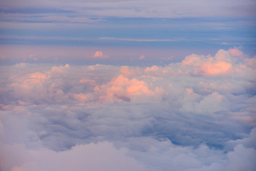 Wall Mural - Beautiful view of sunset or sunrise clouds and sky from airplane window