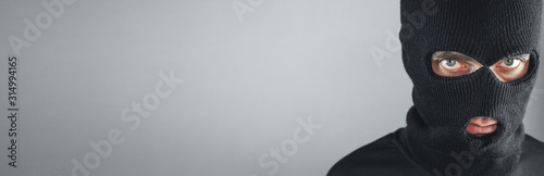 Fotografía Thief in black mask. Space for your text