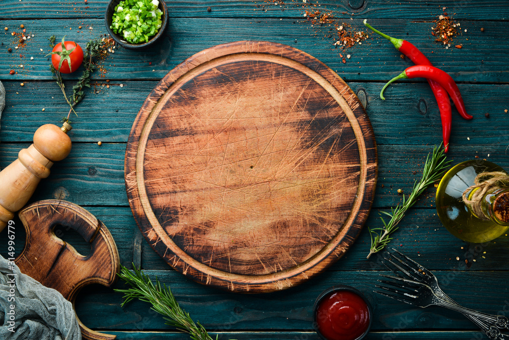 Blue wooden background of cooking. Top view. Free space for your text. - obrazy, fototapety, plakaty 