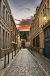 Street in Paris at Dusk with Beautiful Illuminated Lamps