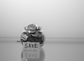 save money for investment concept money in the glass