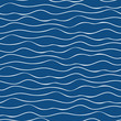 © Gaianami  Design - Vector abstract hand drawn white doodle ocean waves. Seamless geometric pattern on navy blue background. Great for marine, nautical themed products, spa, wellness, beauty, stationery, giftwrap