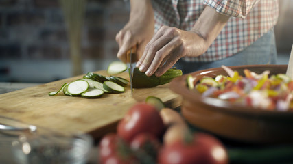 Wall Mural - Woman preparing a healthy vegan meal at home