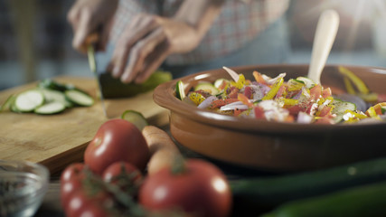 Wall Mural - Woman preparing a healthy vegan meal at home