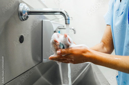 Doctor washing hands before operating. Hospital Concept.