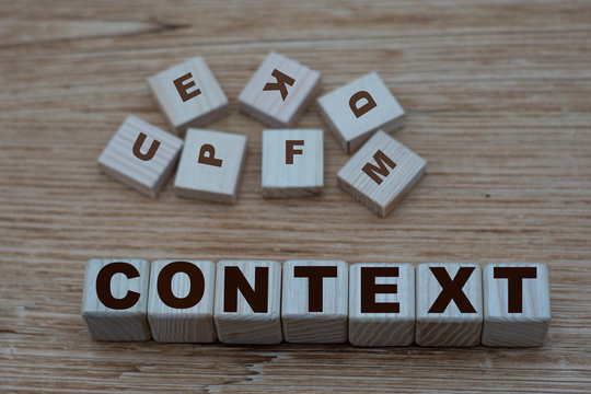 concept words context on cubes on a wooden background