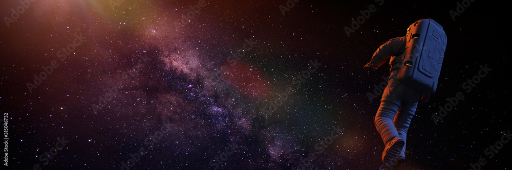astronaut flying towards the beautiful Milky Way galaxy - obrazy, fototapety, plakaty 